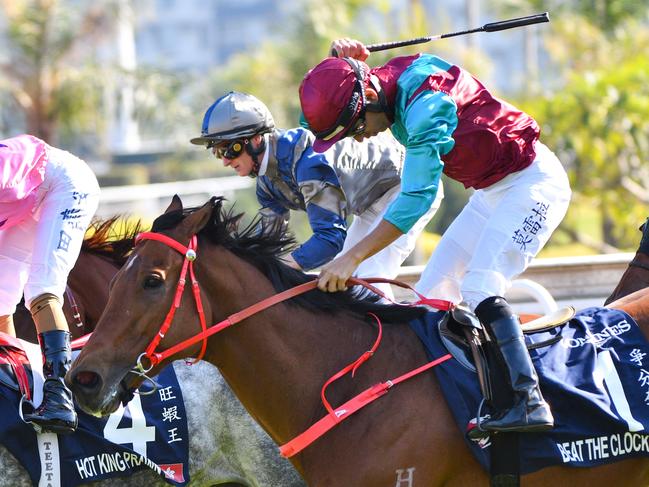 Joao Moreira rides Beat The Clock to victory in the Longines Hong Kong Sprint.