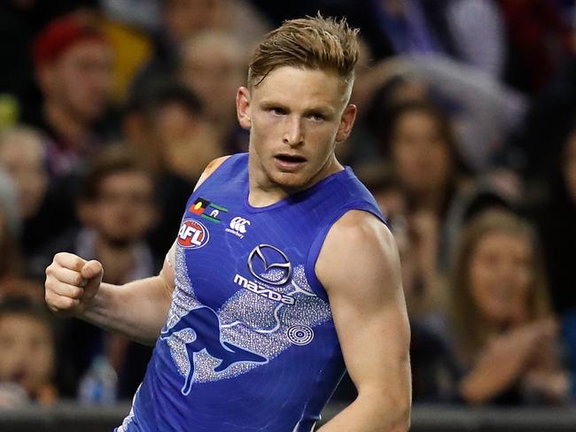 MELBOURNE, AUSTRALIA - JUNE 03: Jack Ziebell of the Kangaroos celebrates a goal during the 2018 AFL round 11 match between the North Melbourne Kangaroos and the Brisbane Lions at Etihad Stadium on June 03, 2018 in Melbourne, Australia. (Photo by Adam Trafford/AFL Media/Getty Images)