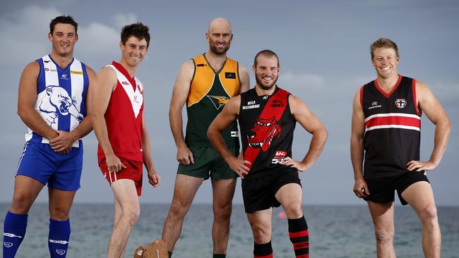 Representatives from the five football teams that comprise the Kangaroo Island Football League.(LtoR) Khyal Stead (Wisanger), Zach Trethewey (Parndana), Clayton Willson (Dudley United), Paul Green (Kingscote), and Josh Graham (Western Districts), together at Emu Bay. Picture: Dean Martin