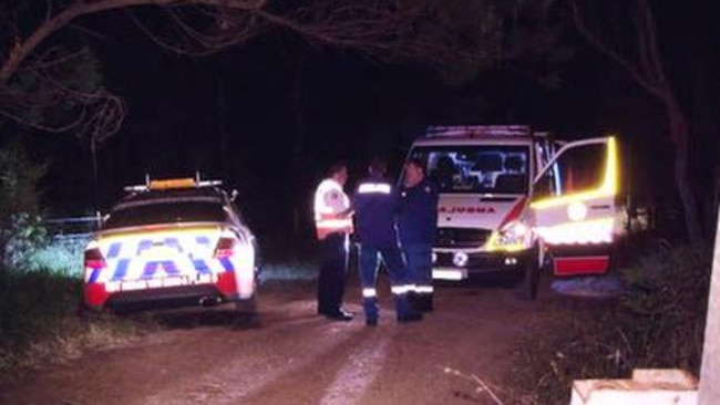 Police and paramedics assess the best way to reach the fallen woman last night. Picture: Twitter/Nine News