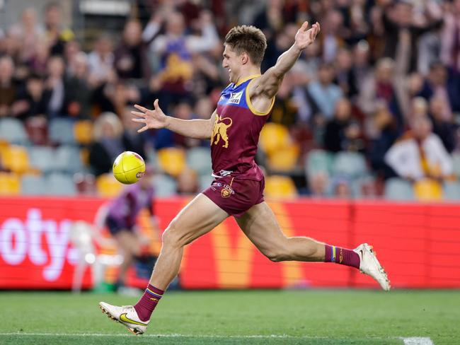 Zac Bailey kicks a goal for the Lions. Picture: Russell Freeman/AFL Photos via Getty Images