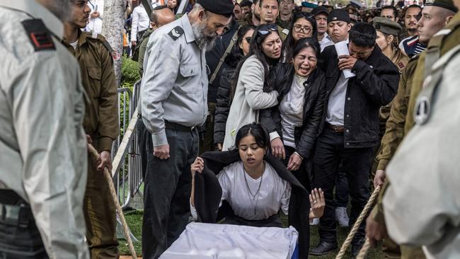 The funeral in Tel Aviv of Israeli-Filipino soldier Cedric Green, one of 21 soldiers killed in a single incident the Gaza Strip this week. Picture: AFP