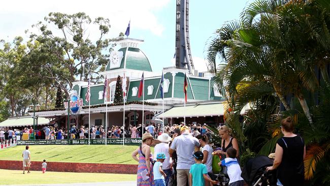 People line up to get into Dreamworld as its packed at the start of the school holidays. Pics Adam Head