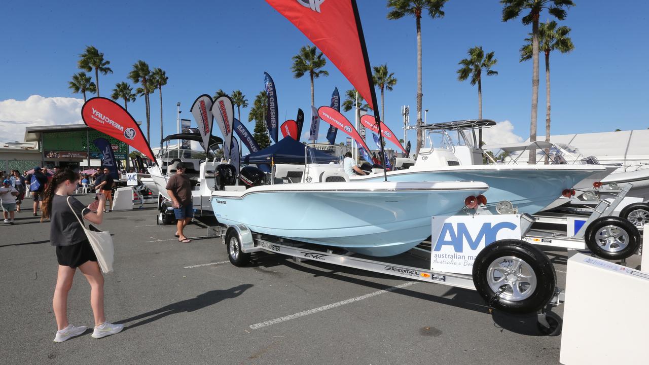 Punters check out some of the merchandise on offer at the Sanctuary Cove International Boat Show. Picture: Mike Batterham