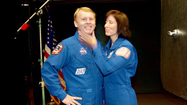 Walker with husband Andy Thomas get suited up as part of their astronaut training at NASA in Houston, Texas, 2004. Picture by Jeff Rayner