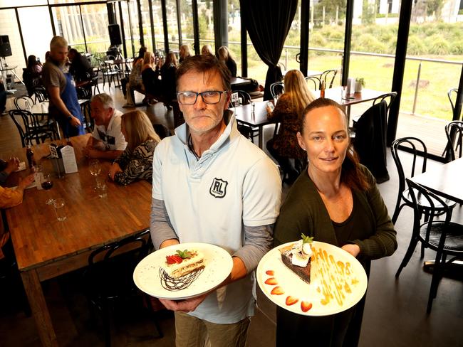 Franz Madlener (left) with wife and owner Brook Pollock at Acrobar on Sunday, June 21, 2020, in Heatherton, Victoria, Australia. Picture: Hamish Blair