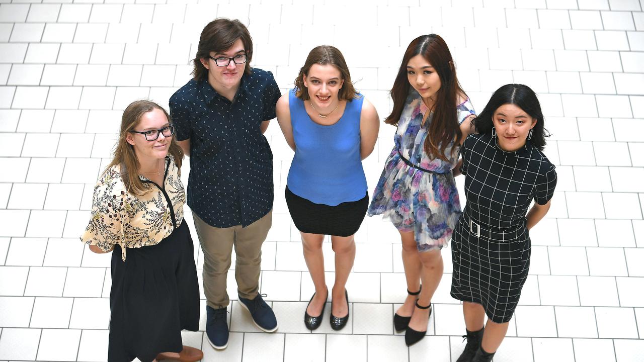 Grace Kennett, Jayden Webster, Maya Lamont, Serena Chen and Enle Yin pose for a photograph at the Student QCE Awards presentation at the State Library. Picture: AAP/John Gass