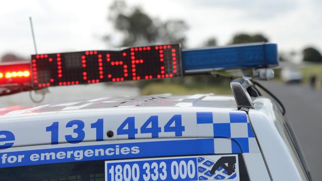 NSW Police road closed sign.