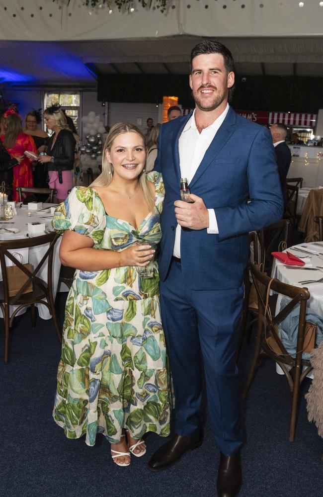 Steph Martin and Joshua Tatham at Emergency Services race day at Clifford Park, Saturday, August 10, 2024. Picture: Kevin Farmer