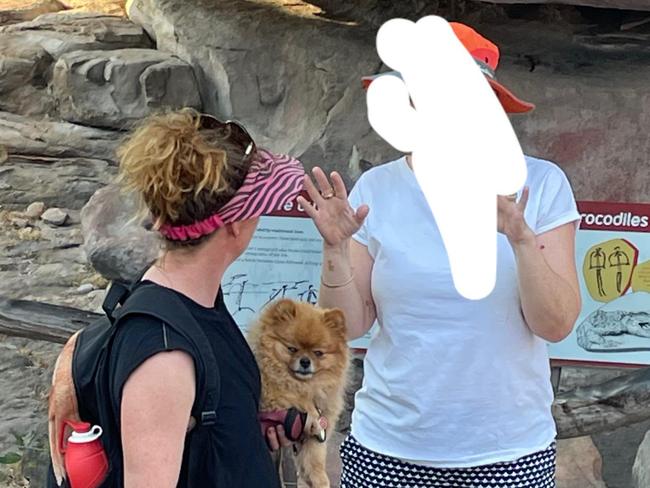 A Reddit user shared an image of two people walking through what appears to be Kakadu National Park. Dogs - excluding guide, hearing, and assistance dogs - are prohibited from Commonwealth national parks.