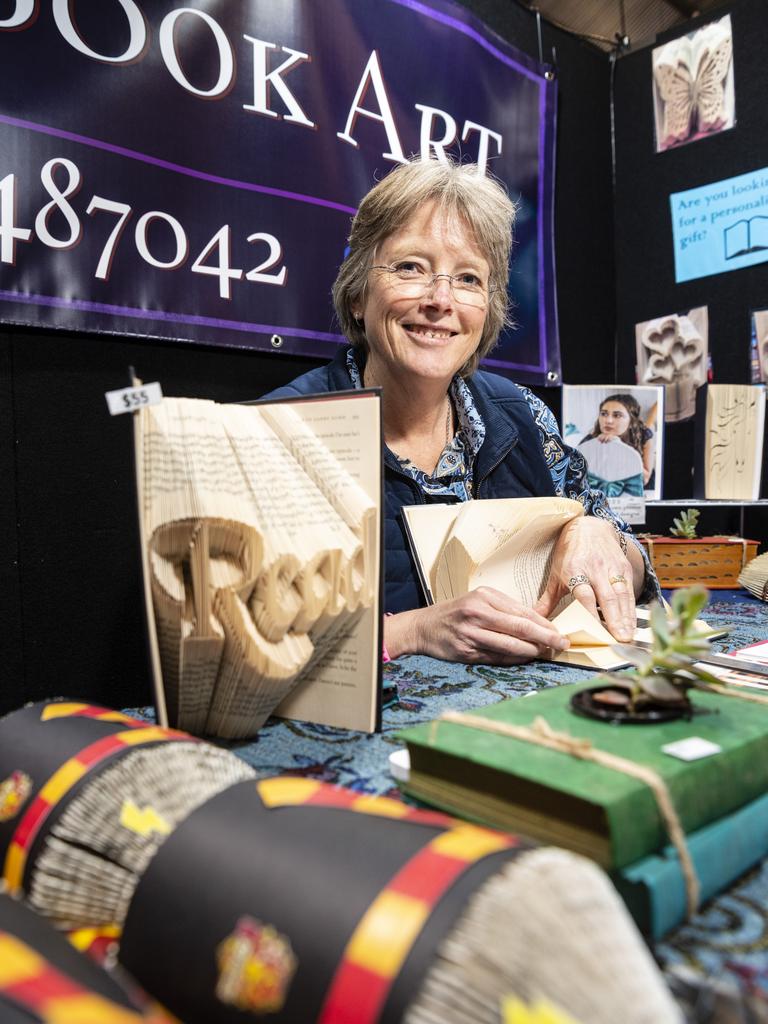 Kylie Meagher shows her work at her Kylie's Book Art stall at Craft Alive at the Goods Shed, Saturday, May 21, 2022. Picture: Kevin Farmer