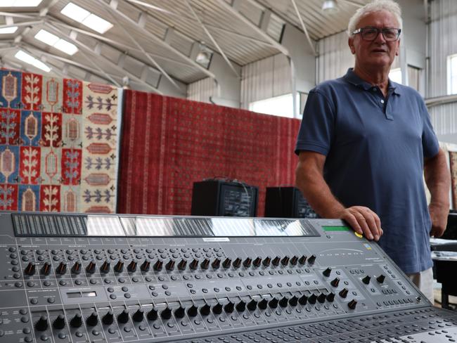 Roger Baker, retired lawyer and executor of the estate of Haeny, with some of the late music producer's sound, recording and mixing equipment currently being auctioned. Picture: Matthew Denholm