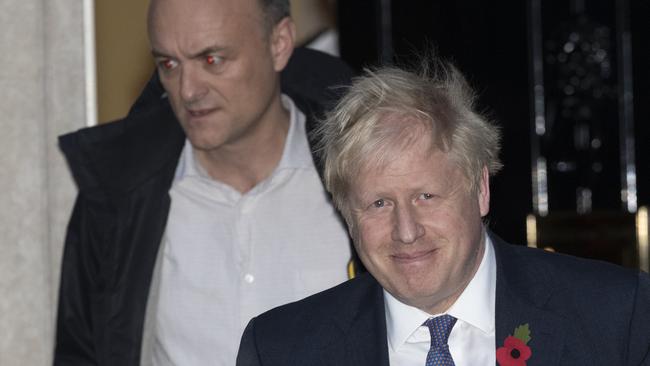 Boris Johnson and his Adviser Dominic Cummings, left, leave 10 Downing Street. Picture: AP.