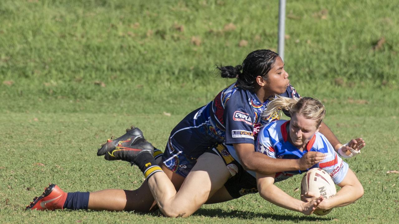 Jayla Sefo can't stop Sarah Hoger scoring a try for TRL Allstars. Picture: Nev Madsen