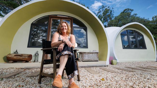 Cath Wild outside her dome home she designed and built at Flaxton in the Sunshine Coast hinterland. Picture Lachie Millard