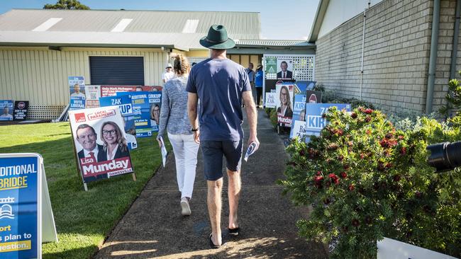 Voters leave the polling place at the Falcon Primary School in the southern suburb of Falcon during the final day of Western Australia's state election. Picture: NCA NewsWire / Tony McDonough