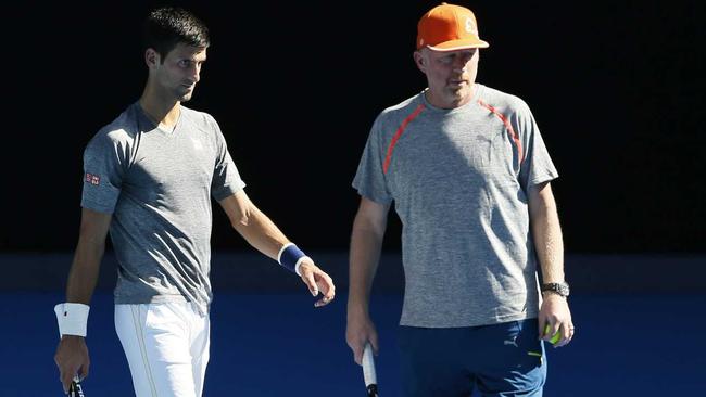 Novak Djokovic practices with coach Boris Becker yesterday. Photo: AAP Image