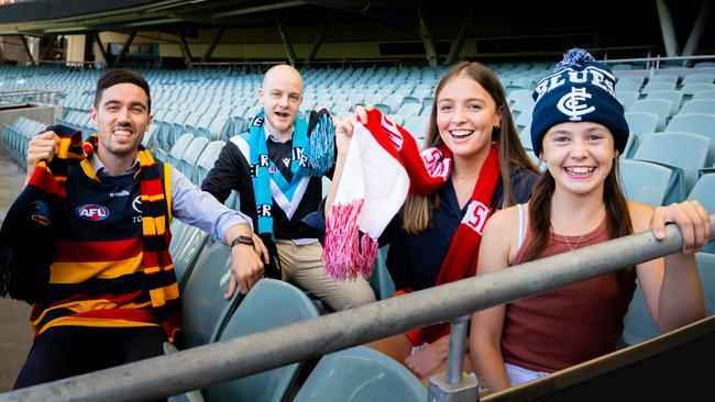 AFL fans Tyson Staples, Tom, Sadie Vikor-Ian and Indy Threadgold ahead of the Ultimate Membership offering at Adelaide Oval, which provides entry to all six matches in AFL's festival of footy. Picture: Morgan Sette