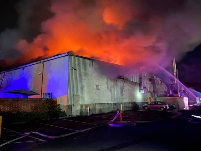 The July 9 factory fire was tackled by 100 firefighters. Pictures: Fire and Rescue NSW