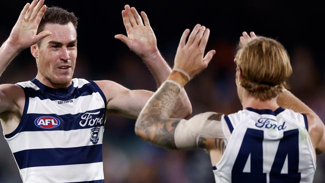 ADELAIDE, AUSTRALIA - APRIL 06: Jeremy Cameron (left) and Tom Stewart of the Cats celebrate during the 2024 AFL Round 04 match between the Western Bulldogs and the Geelong Cats at Adelaide Oval on April 06, 2024 in Adelaide, Australia. (Photo by Michael Willson/AFL Photos via Getty Images)