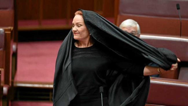 STUNT? One Nation senator Pauline Hanson removes the burqa. Picture: LUKAS COCH