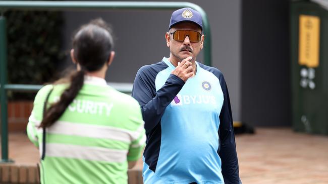 Security looks on as Ravi Shastri walks into the ground. Picture: Ryan Pierse/Getty Images