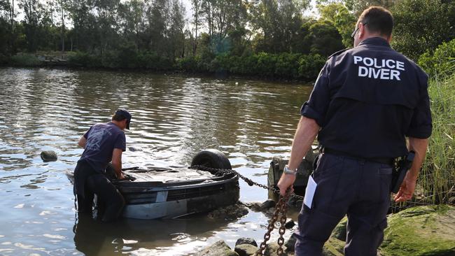 Police recover a car as part of the investigations into CTP fraud from the Georges River at the Floyds Bay Boat Ramp, Lansvale on Thursday April 6, seizing it for forensic examination. Picture: Supplied