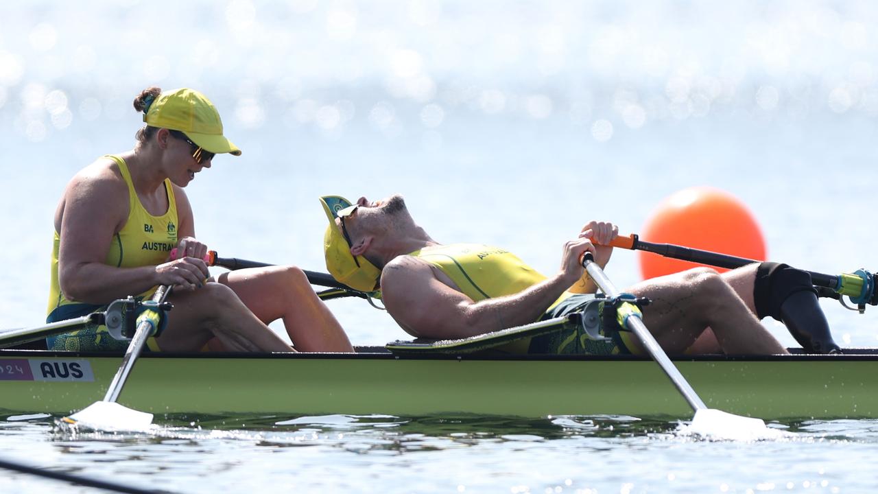 Gold medallists Nikki Ayers and Jed Altschwager of Team Australia react after crossing the finish line for the PR3 mixed double sculls final A on day four at Vaires-Sur-Marne Nautical Stadium. Picture: Naomi Baker/Getty Images