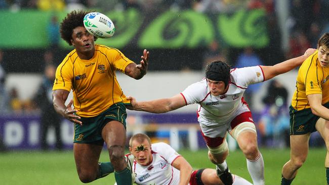 Radike Samo juggles the ball as Russia’s Andrey Garbuzov comes in for a tackle. Picture: Getty