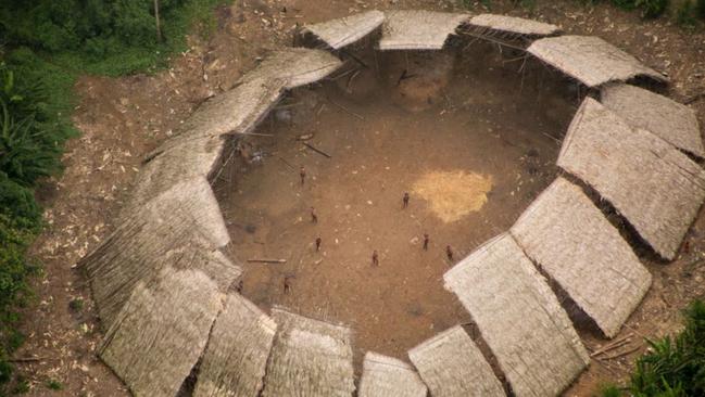 An uncontacted Yanomami tribe in Brazilian Amazon are photographed by a plane flying overhead. Picture: Guilherme Gnipper Trevisan/Hutukara