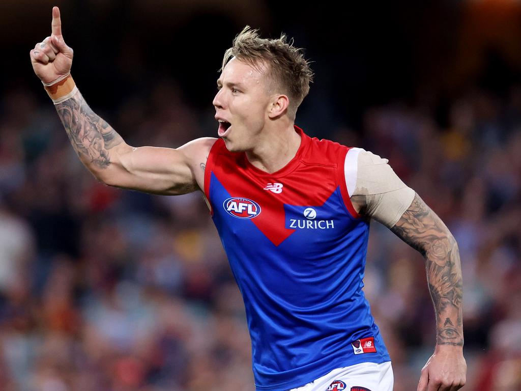 The Demons and the Crows went toe-to-toe on Saturday night. (Photo by James Elsby/AFL Photos via Getty Images)