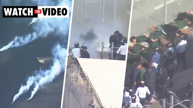 Riot officers deploy tear gas at Long Bay prison