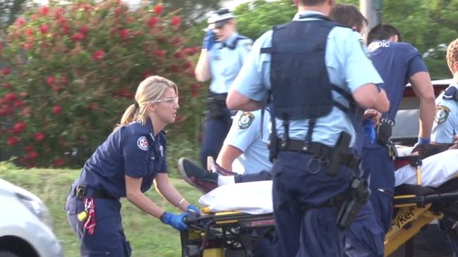 Paramedics rush 26-year-old Liam Anderson to an ambulance to be transported via helicopter to hospital, but he died before it arrived. Picture: TNV