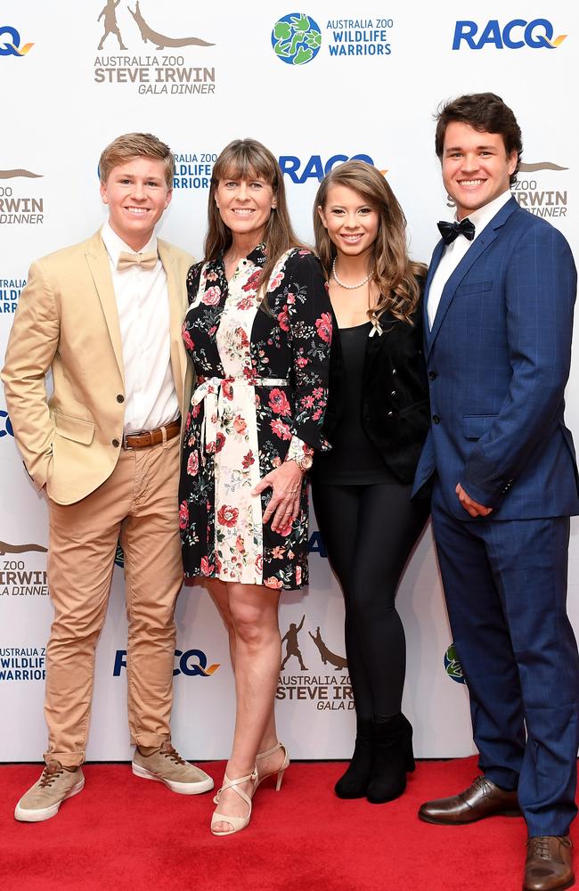 Robert Irwin, Terri Irwin, Bindi Irwin and Chandler Powell, pictured at the annual Steve Irwin Gala Dinner at Brisbane Convention &amp; Exhibition Centre on November 09, 2019, will light a candle for Steve at Bindi and Chandler’s wedding reception. Picture: Bradley Kanaris/Getty Images