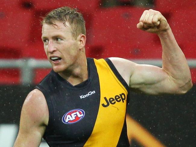 16/06/2012 WIRE: SYDNEY, AUSTRALIA - JUNE 16: Daniel Connors of the Tigers celebrates kicking a goal during the round 12 AFL match between the Greater Western Sydney Giants and the Richmond Tigers at Skoda Stadium on June 16, 2012 in Sydney, Australia. (Photo by Matt King/Getty Images) Pic. Images Getty
