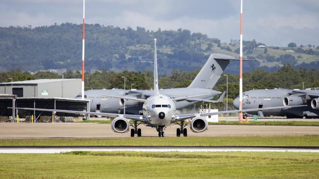 A Royal Australian Air Force P-8 Poseidon aircraft departs RAAF Base Amberly to assist the Tongan Government.