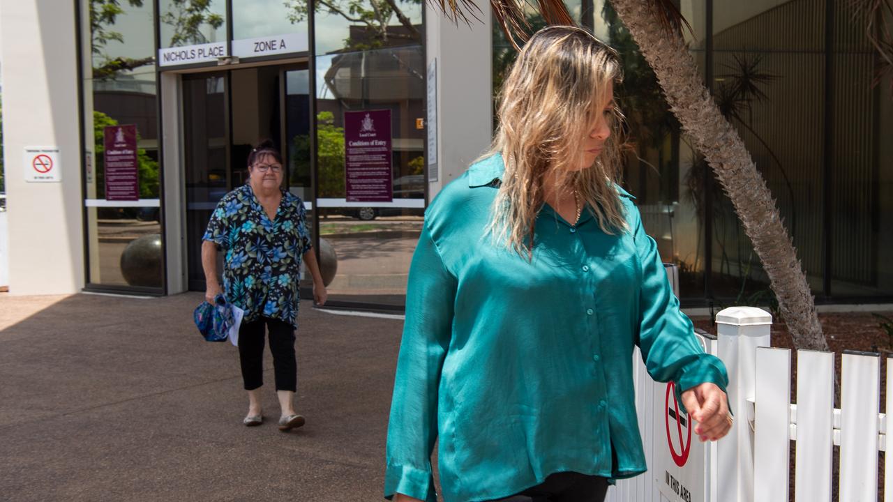 Maria Schoolmeester leaves the Darwin Local Court on Friday with Mr Schoolmeester’s mother behind. Picture: Pema Tamang Pakhrin