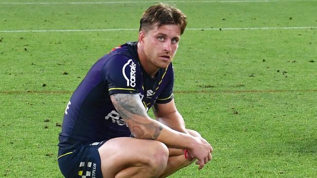 BRISBANE, AUSTRALIA - SEPTEMBER 25: Cameron Munster and Harry Grant of the Storm looks dejected after defeat during the NRL Preliminary Final match between the Melbourne Storm and the Penrith Panthers at Suncorp Stadium on September 25, 2021 in Brisbane, Australia. (Photo by Bradley Kanaris/Getty Images)