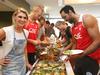 Former MasterChef contestant Courtney Roulston cooking lunch for Sydney Swans players who have their first home game on Saturday. Photo: Bob Barker.