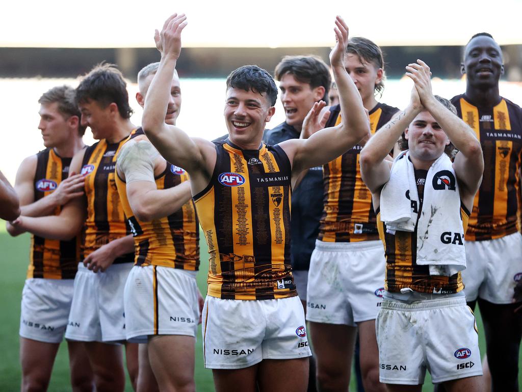 Massimo D’Ambrosio and his Hawks teammates celebrate the win. Picture: Mark Stewart