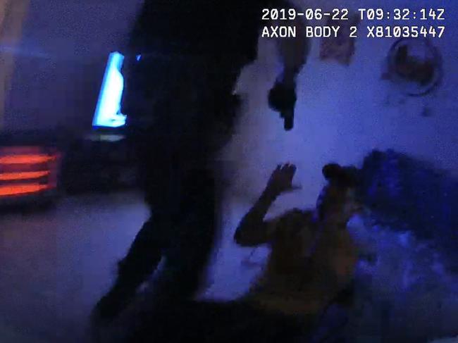 A still of body-worn camera footage of Zach Rolfe arresting Christopher Walker in Alice Springs in 2019.