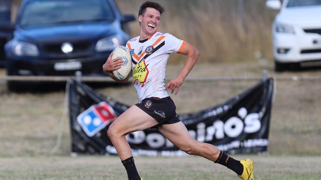 Daniel Payne breaks away for The Oaks Tigers. Picture: Steve Montgomery