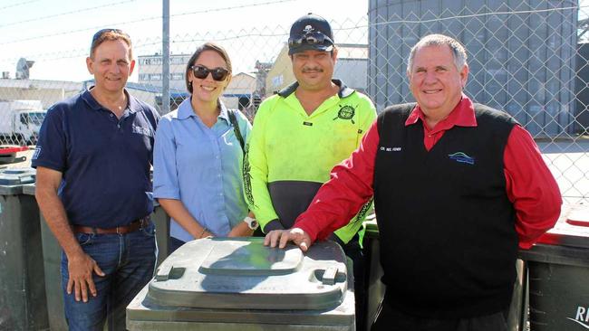 BIN A BIG HELP: Cr Tony Williams, Stephanie Foote and Neil Xavier of JRFC with Cr Neil Fisher. Picture: contributed