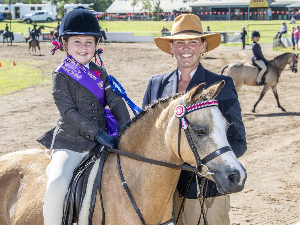 5 year old Audrey Siebenhausen won Champion Leading Rein Rider at her first Toowoomba Royal Show, pictured with her mother Amy Siebenhausen and her horse also named Audrey. Friday, March 25, 2022. Picture: Nev Madsen.