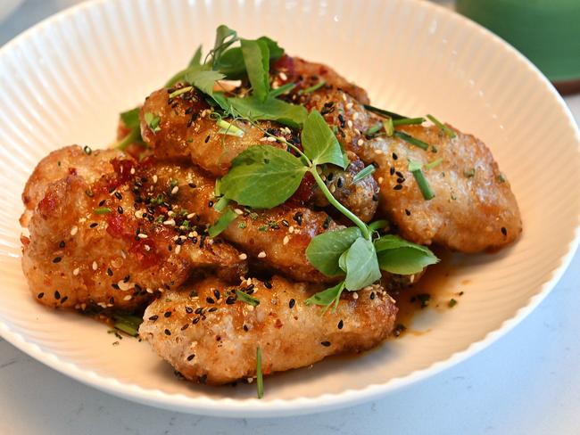 Luc Lac’s hot sticky and sweet chicken wings with garlic and chives. Picture: Lyndon Mechielsen