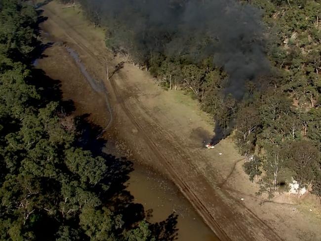 Rescue crews raced to the site, through dense bushland. Picture: 7News