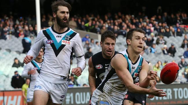 Jack Trengove gets a handball away in his AFL first game for Port Adelaide against Carlton. Picture: Michael Klein