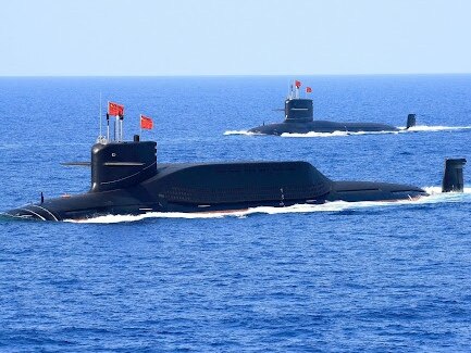 Chinese nuclear-powered missile and attack submarines parade for Chairman Xi Jinping. Picture: PLAN