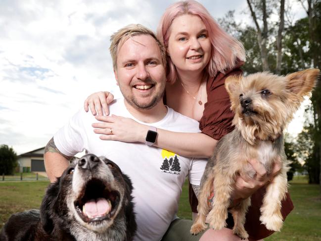 Thomas McNamara and Madeline Scott, pictured with dogs Dexter and Oliver, do not plan to have children. Picture: Steve Pohlner