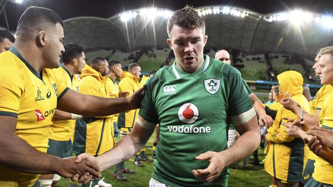 Ireland captain Peter O’Mahony leads his players off after victory in Melbourne.